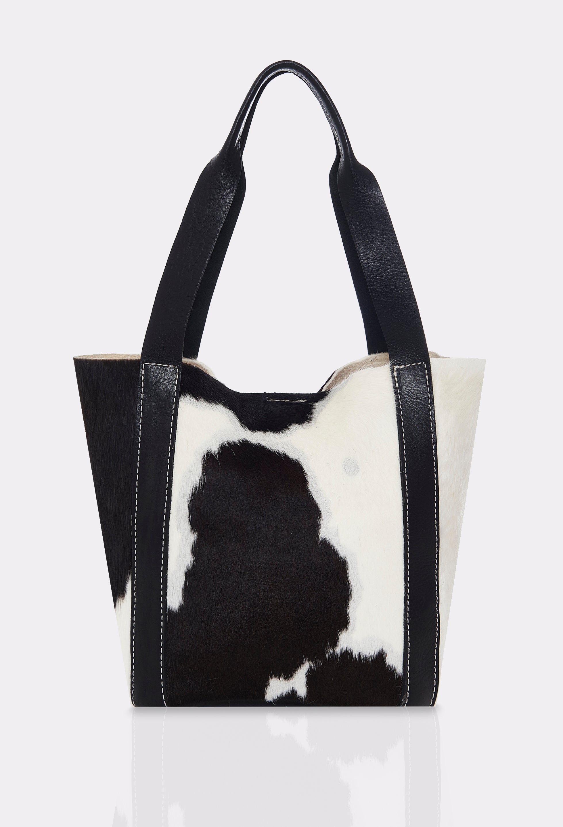 Front of a Black Cowhide Leather Mini Bucket Bag Ushuaia with contrast stitching highlights.