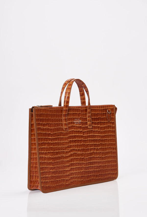 Side of a Tan Croco Leather Slim Briefcase with Lazaro logo.