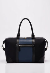 Rear of a Black Canvas and Leather Duffel Bag that shows a blue leather strap, a zippered pocket and leather handles.