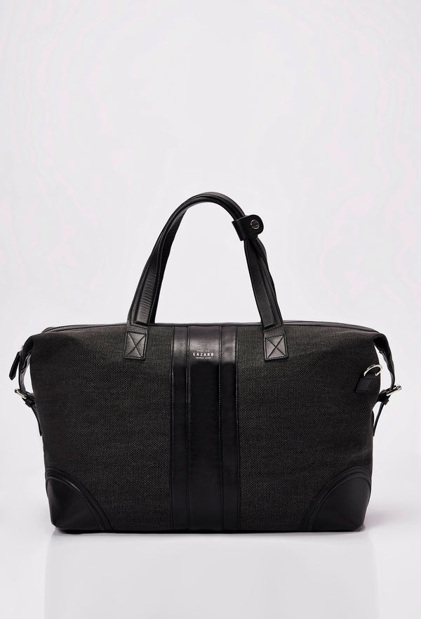 Front of a Black Large Canvas Duffel Bag with Lazaro logo, leather stripes and handles.
