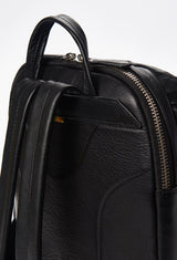 Partial photo of a Black Leather Backpack with ergonomically shaped rear, leather padded and adjustable straps.