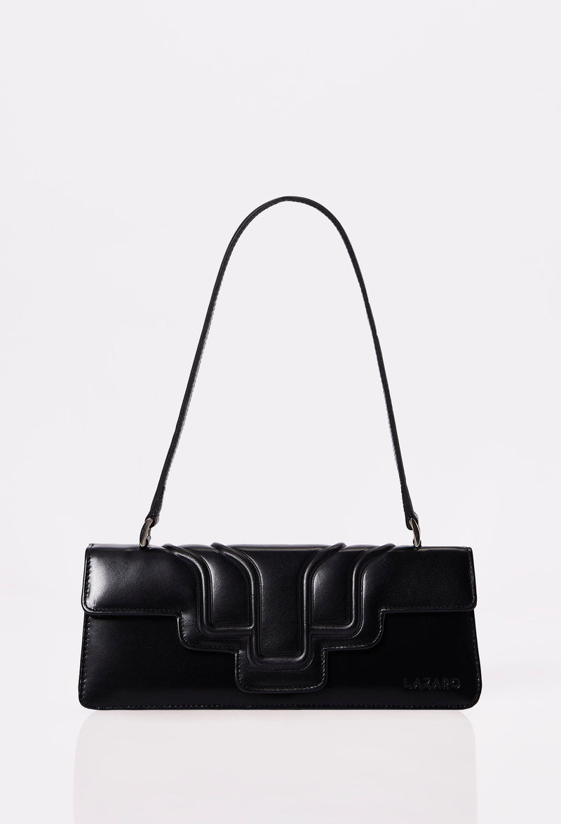 Front of a Black Leather Shoulder Flap Bag Hilda with a raised design flap and Lazaro logo.