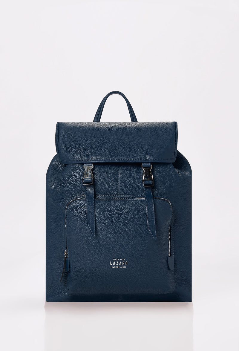 Front of a Blue Large Leather Backpack with Buckle Closure, that shows a slver Lazaro logo and a front zippered pocket.