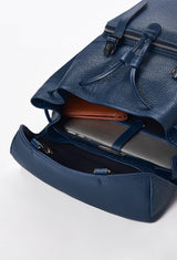 Interior of a Blue Large Leather Backpack with Buckle Closure that shows a main compartment with a Lazaro wallet and a special compartment for a computer.