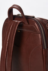 Partial photo of a Coffee Leather Backpack with ergonomically shaped rear, leather padded and adjustable straps.