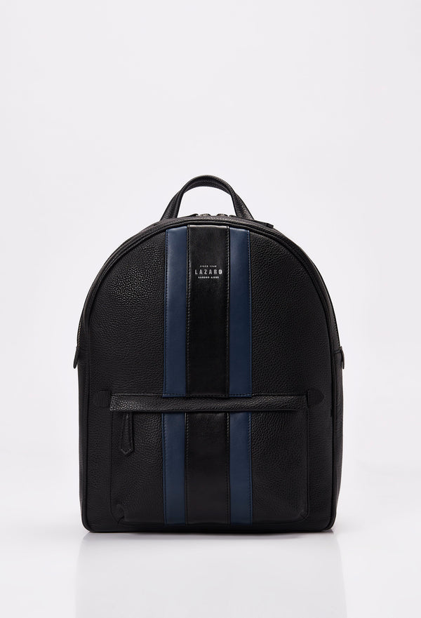 Front of a Leather Backpack made from black Full-Grain pebbled leather with Nappa leather trims in blue and black. It has the Lazaro logo and a front zippered pocket.