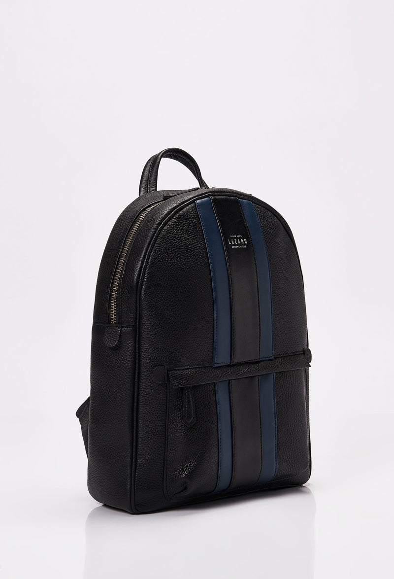 Side of a Lightweight Leather Backpack made from black Full-Grain pebbled leather with Nappa leather trims in blue and black. It has a main zippered compartment, the Lazaro logo and a front zippered pocket.