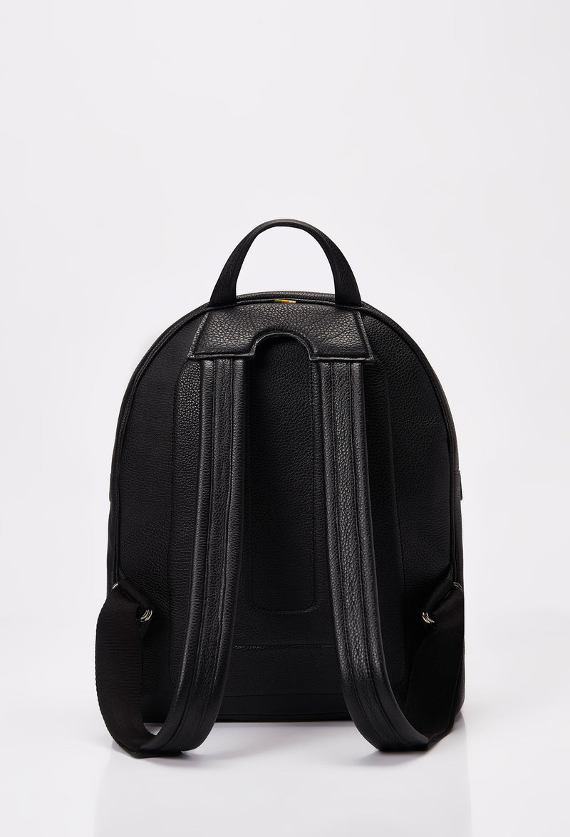 Rear of a backpack in Black Leather, ergonomically shaped and featuring leather padded and adjustable straps.