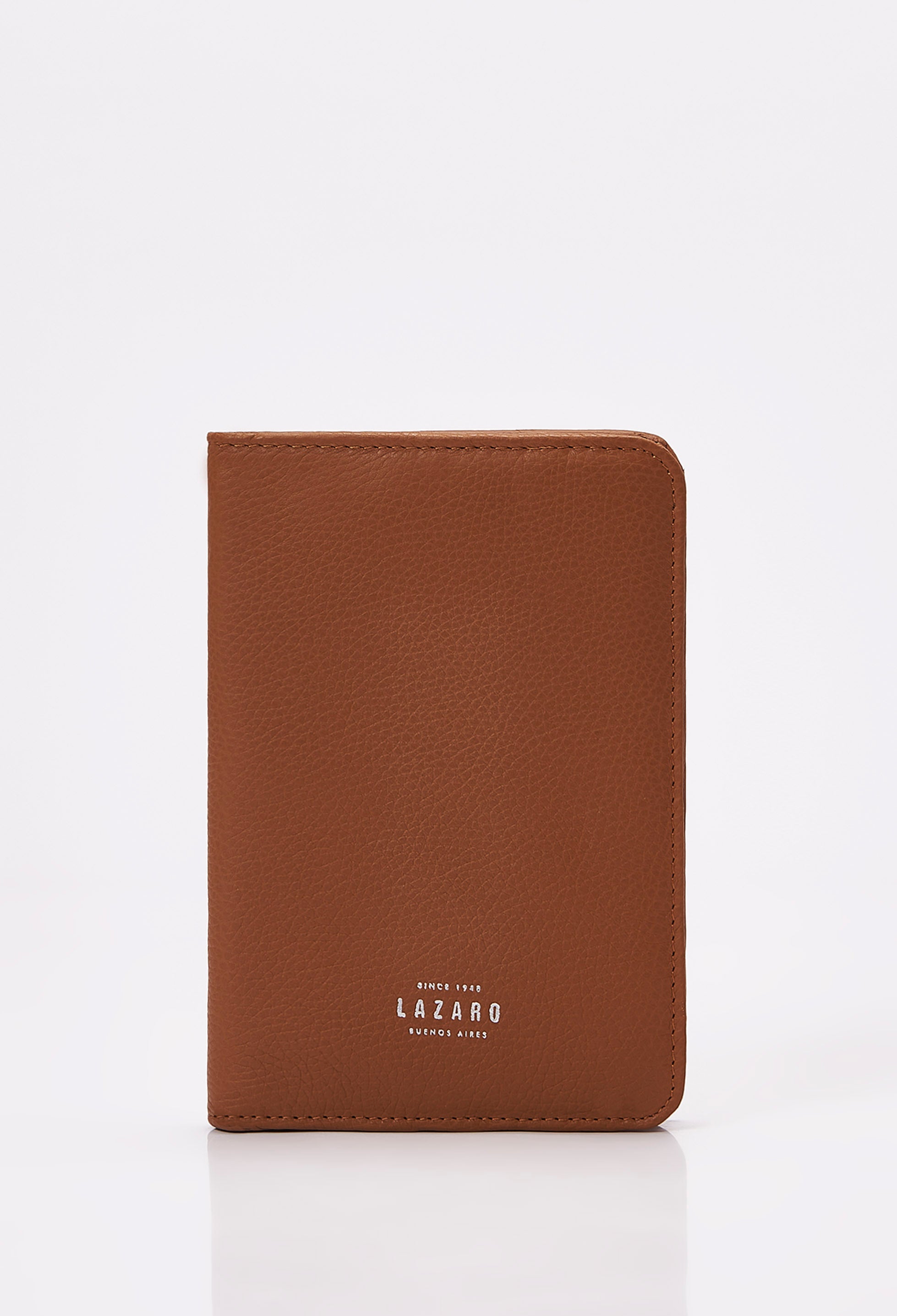 Front of a Tan Leather Passport Holder with Lazaro logo.