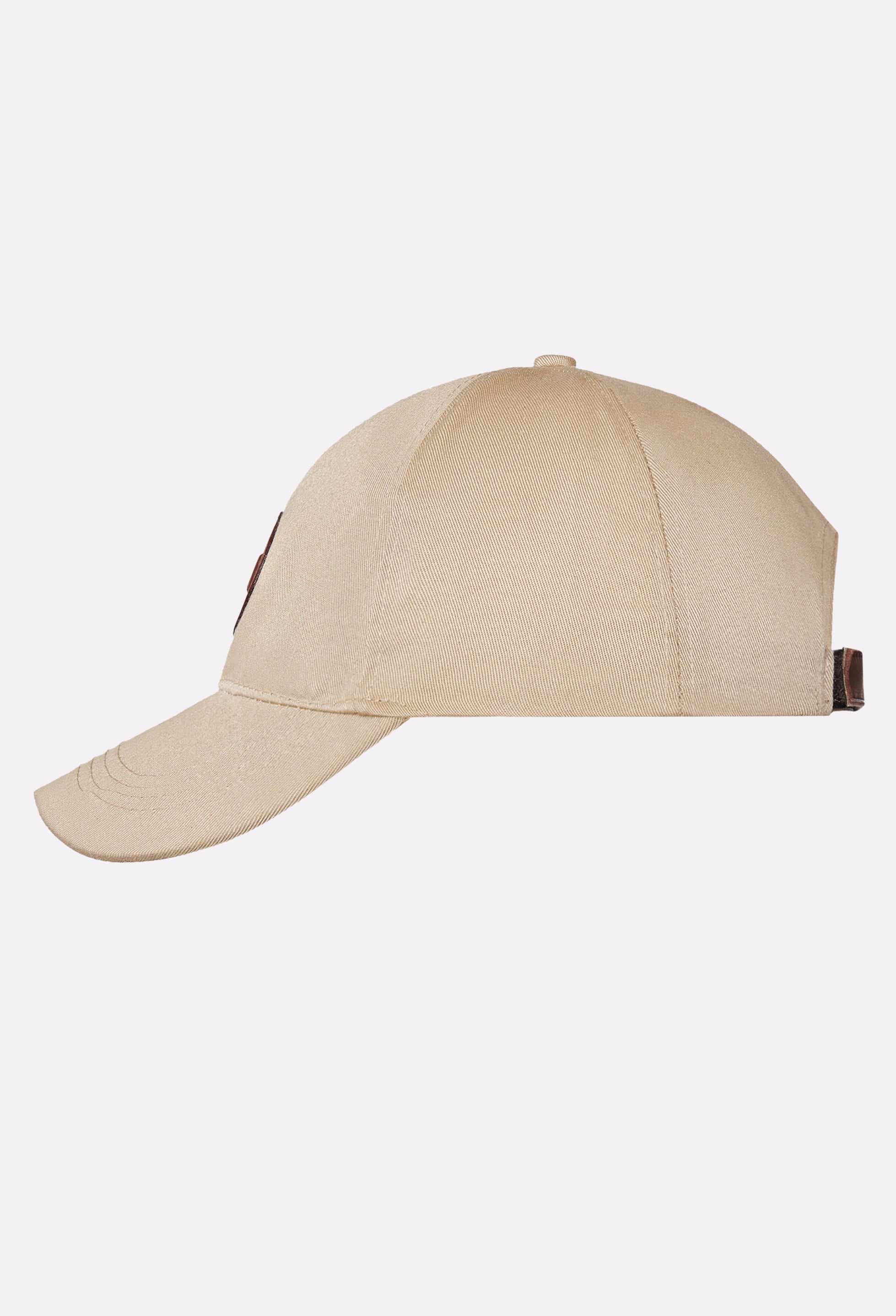 Side of a Beige Baseball Cap with a Patched Leather Lazaro Logo and a leather adjustable strap.