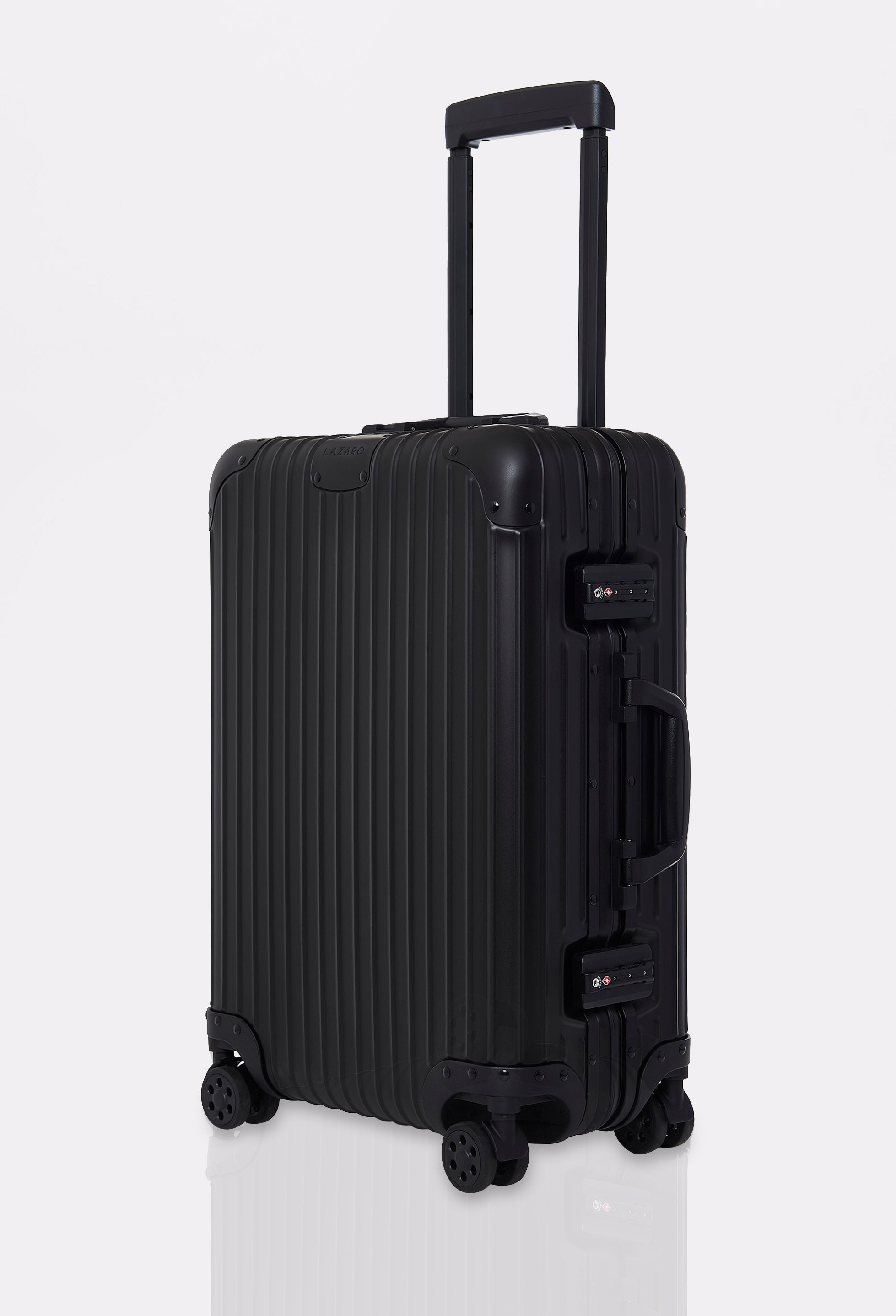Side of a Black Carry-On ‘Genesis’ 20, crafted from top-quality aluminum. Features two integrated TSA locks, adjustable handle and 360° wheels.