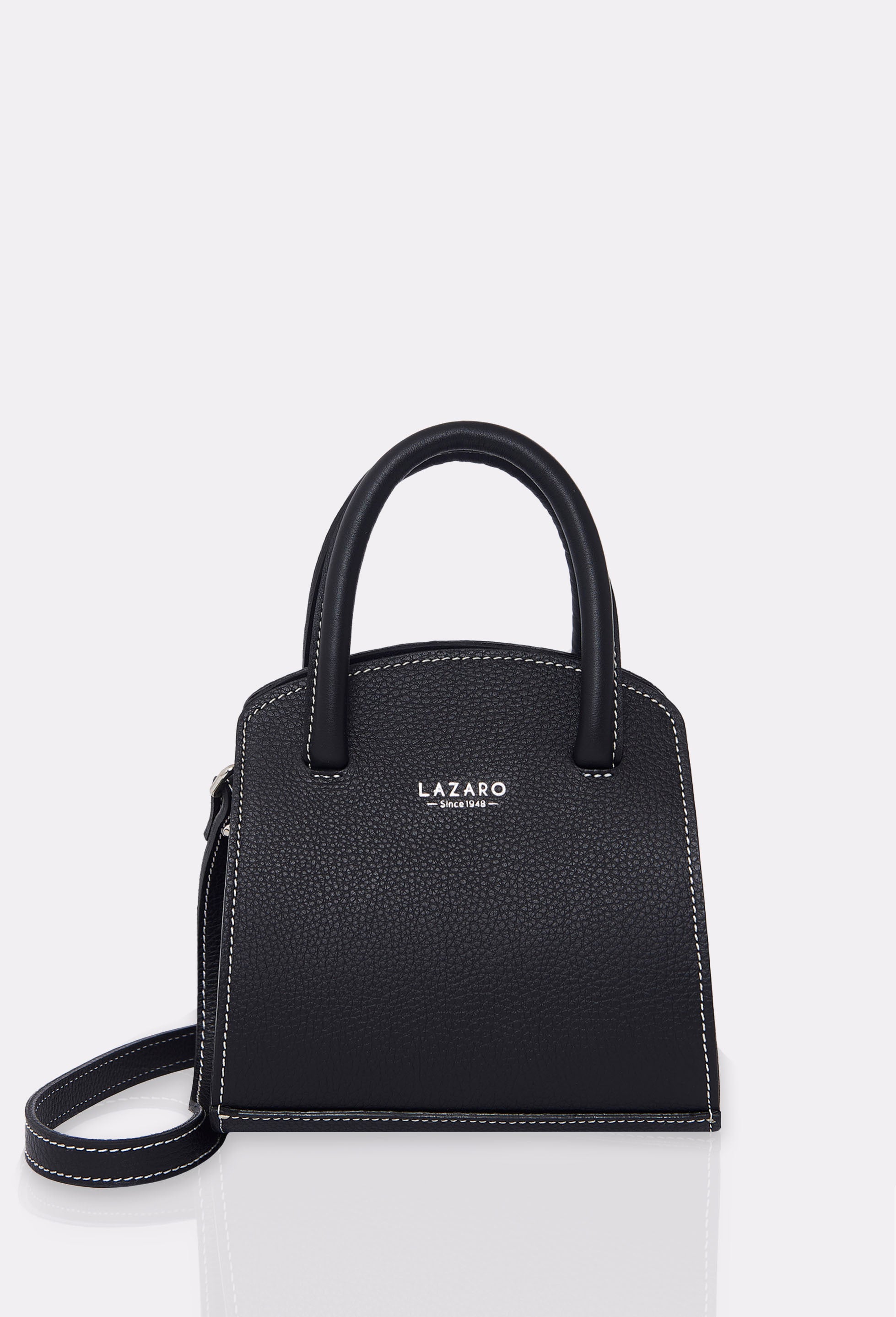 Front of a Black Leather Mini Bag Margot with a leather adjustable and detachable strap, silver embossed Lazaro logo and contrast stitching highlights.