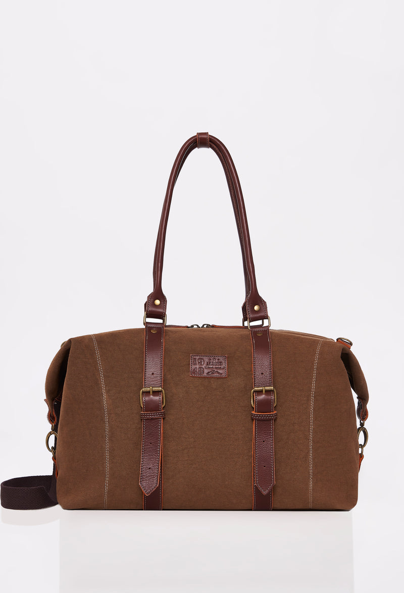 Front of a Coffee Canvas Duffel Bag with Lazaro logo and leather straps.