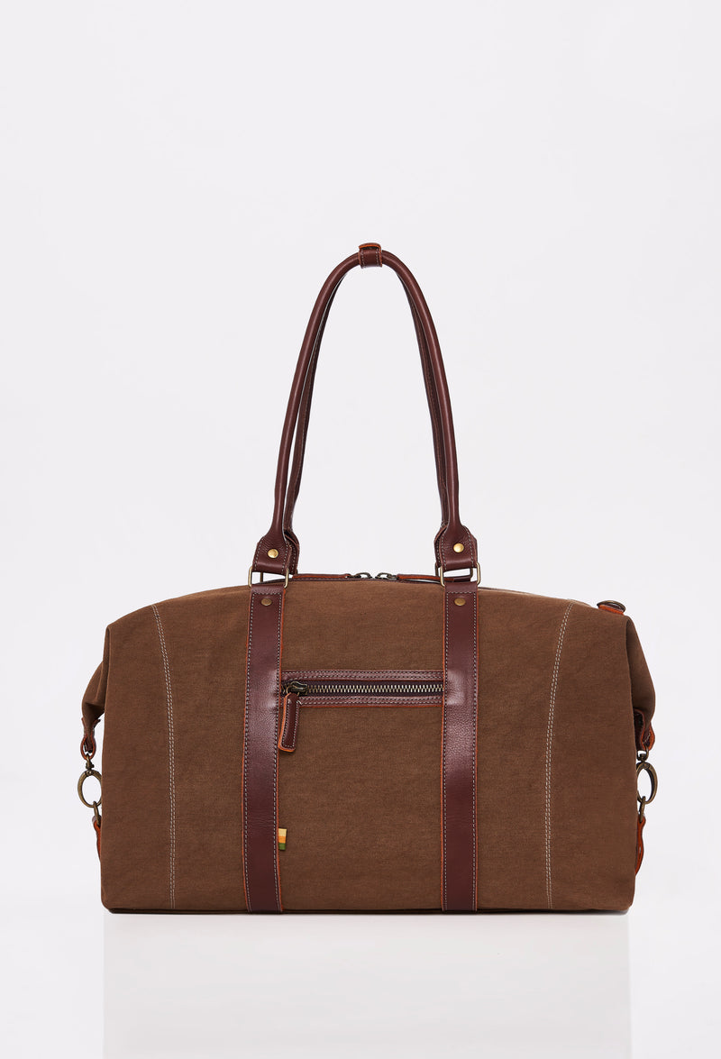 Rear of a Coffee Canvas Duffel Bag that shows a zippered pocket and leather handles.