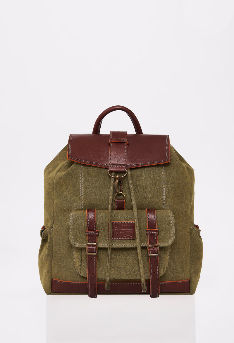Front of a Olive Canvas Backpack with Lazaro logo, distressed antiqued bronze fittings and leather details.