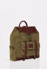 Side of a Olive Canvas Backpack with Lazaro logo, distressed antiqued bronze fittings and leather details.