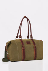 Side of a Olive Canvas Duffel Bag with Lazaro logo, leather handles and a detachable shoulder strap.