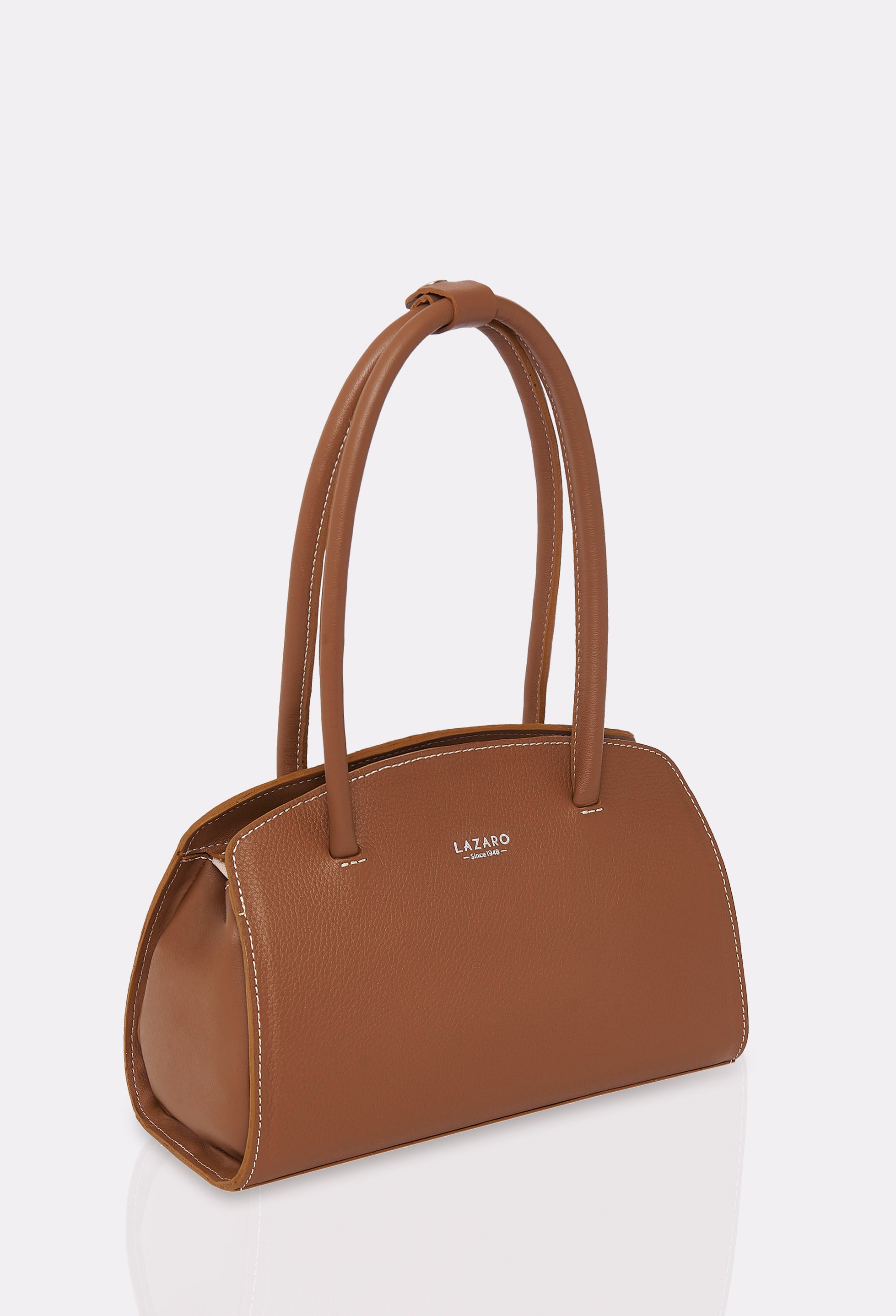 Side of a Tan Leather Shoulder Bag Margot with Lazaro logo and contrast stitching highlights.