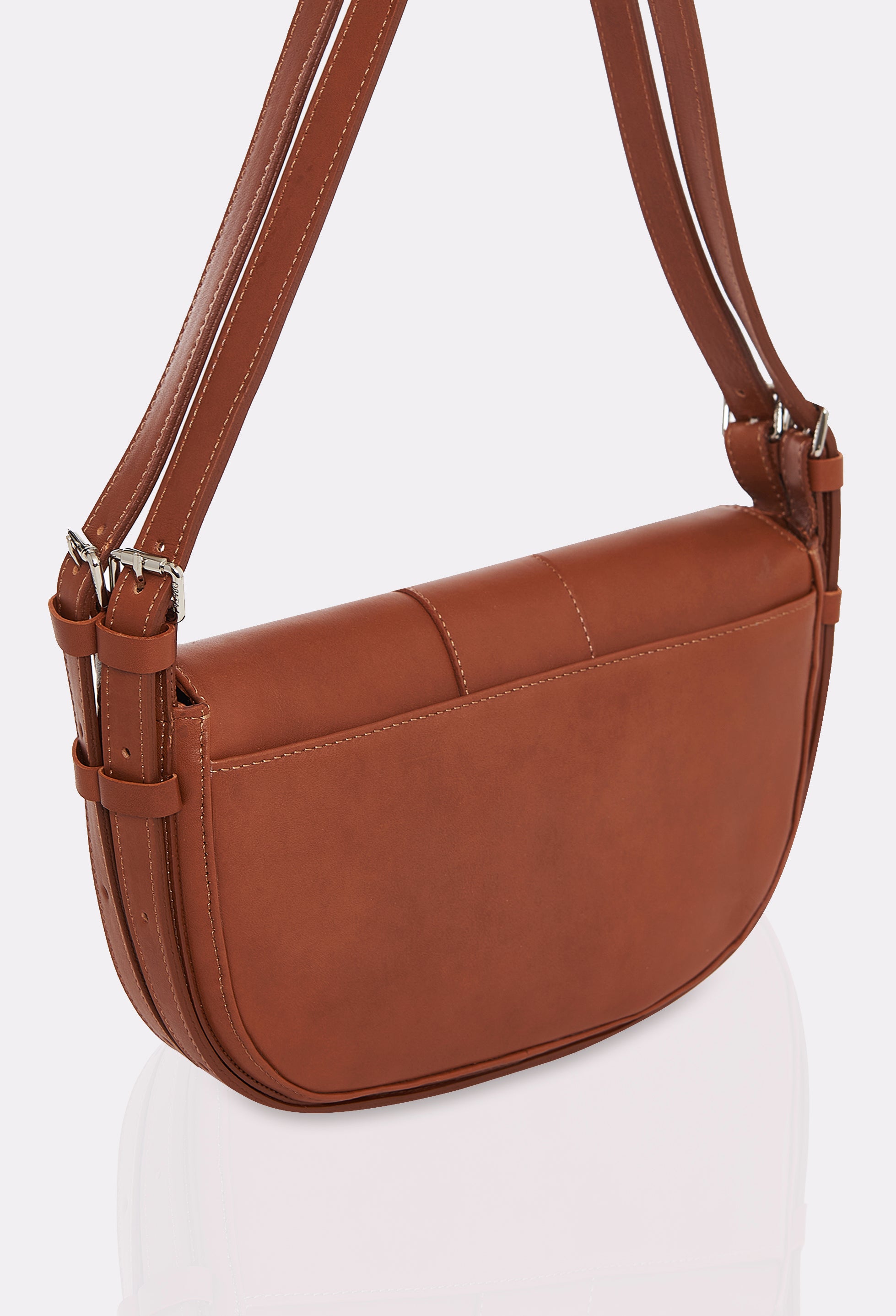 Rear of a Tan Leather Shoulder Bag Montana with a double leather strap and an external multifunctional pocket.