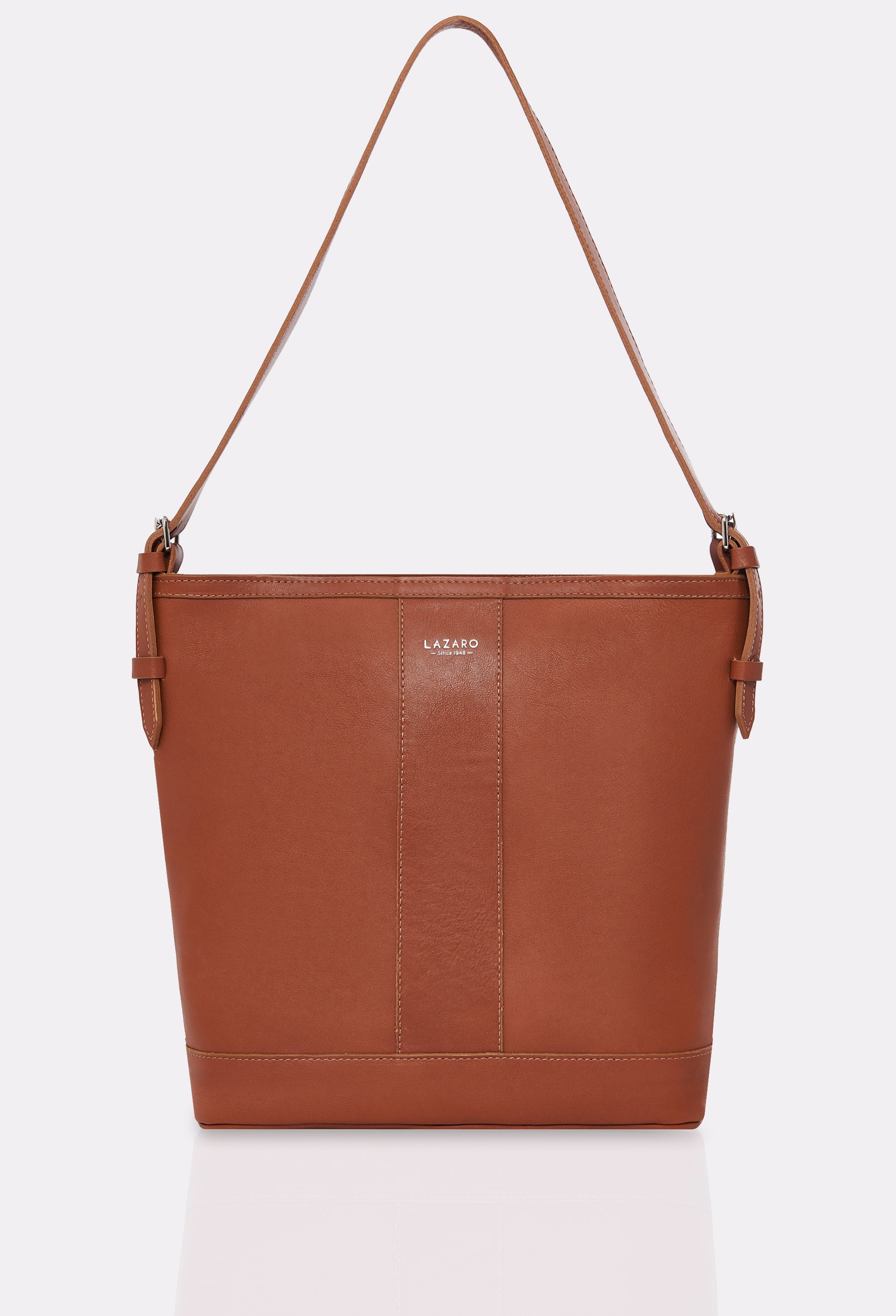 Front of a Tan Leather Tote Bag Montana with leather padded and adjustable strap and silver embossed Lazaro logo.