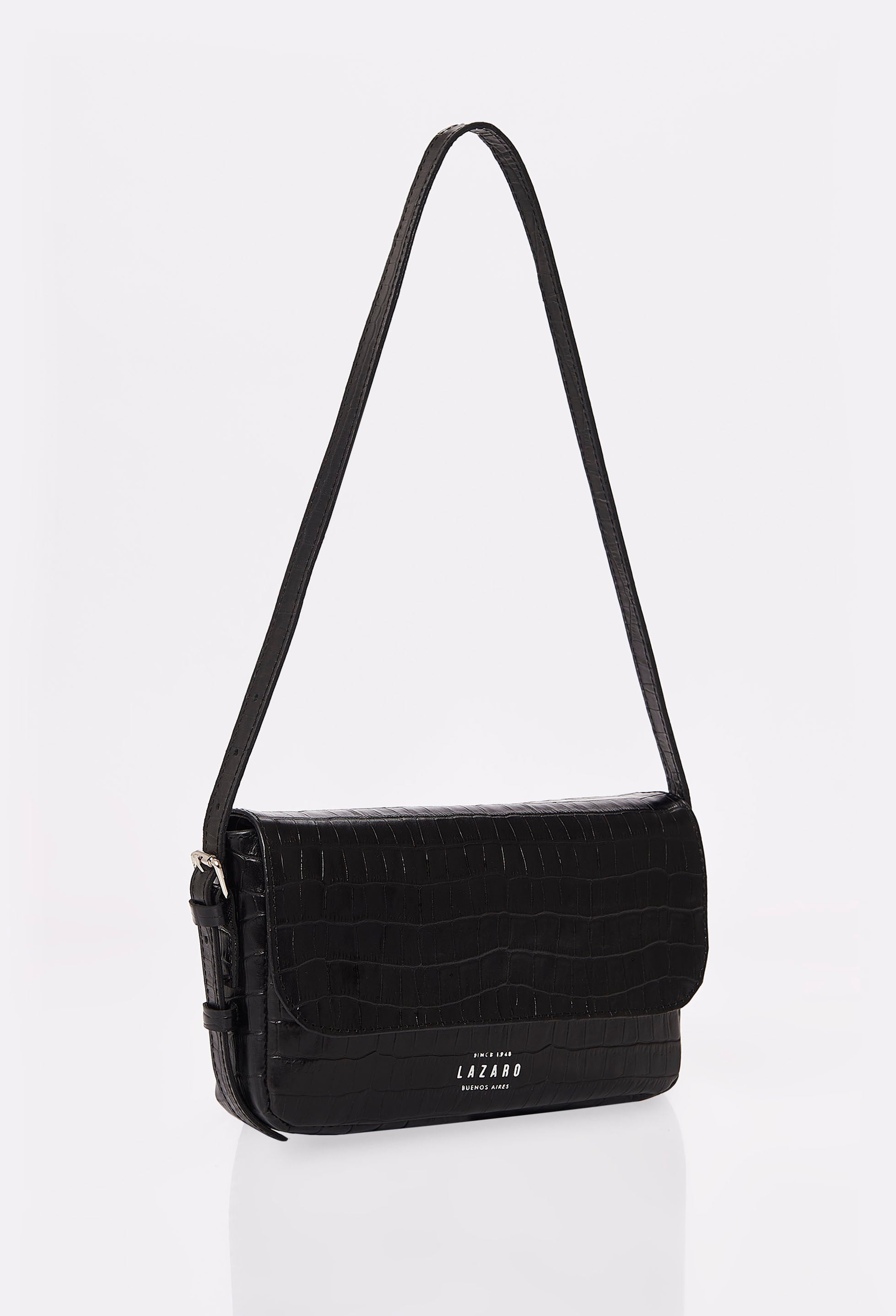 Side of a Black Croco Leather Shoulder Flap Bag Gwen with Lazaro logo and adjustable shoulder strap.