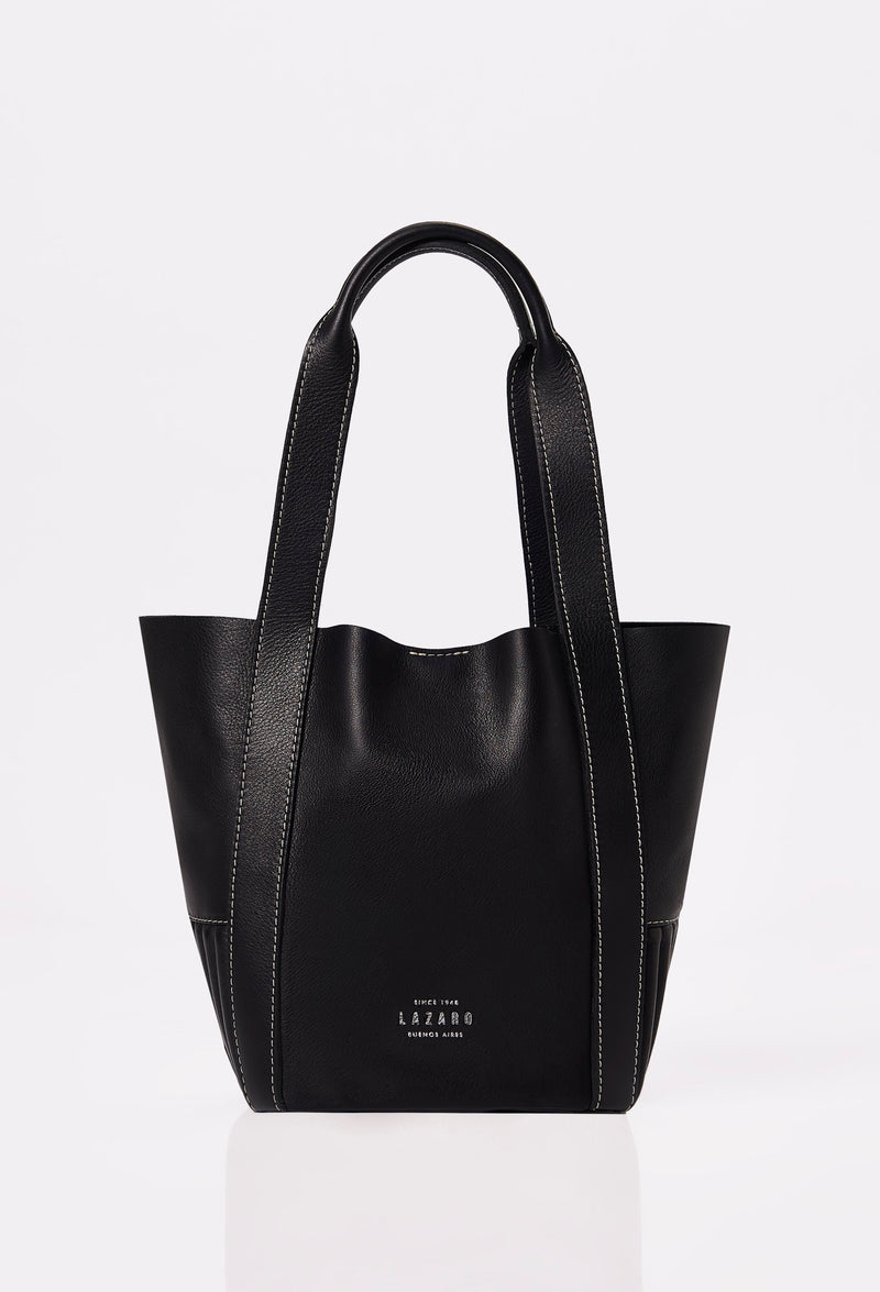 Front of a Black Leather Mini Bucket Bag Ushuaia with Lazaro logo and contrast stitching highlights.