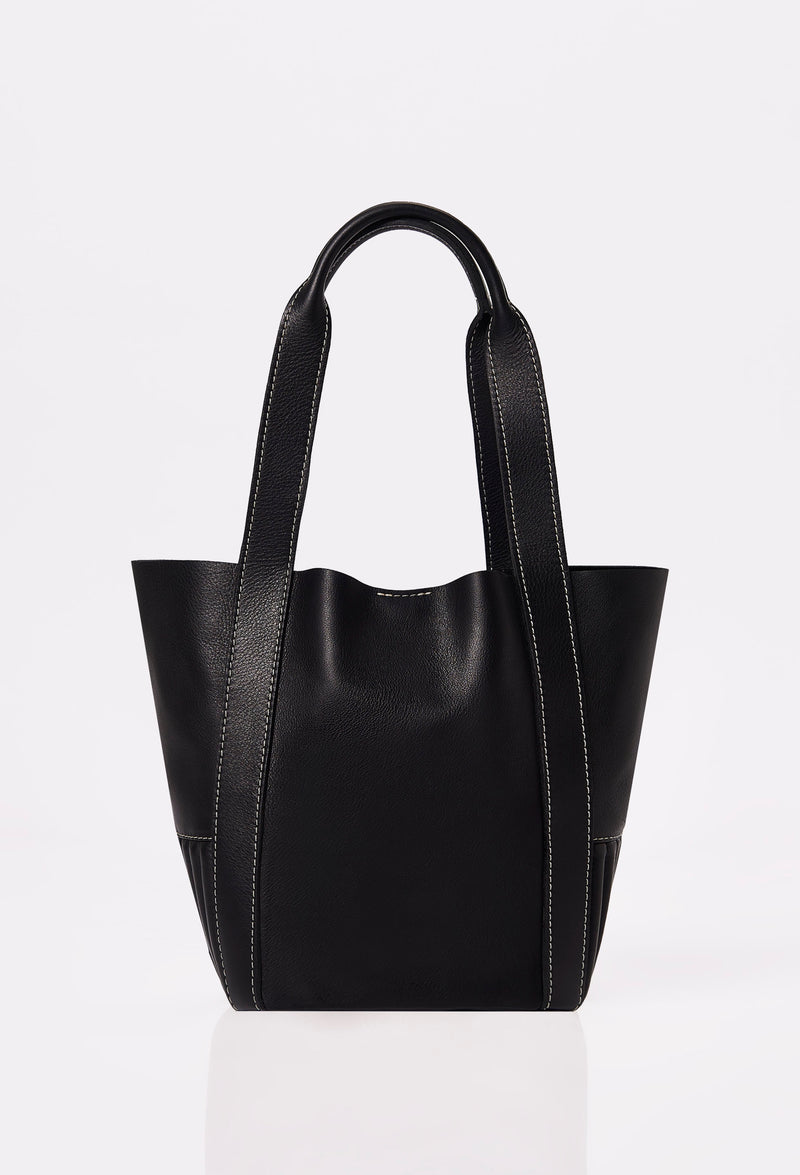 Rear of a Black Leather Mini Bucket Bag Ushuaia with contrast stitching highlights.