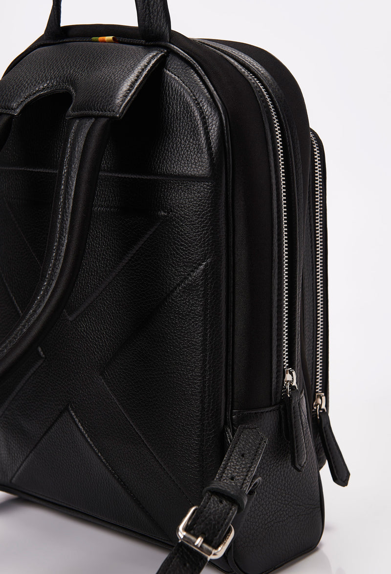 Partial photo of a Black Neoprene and Leather Backpack with ergonomically shaped rear, leather and neoprene padded and adjustable straps.