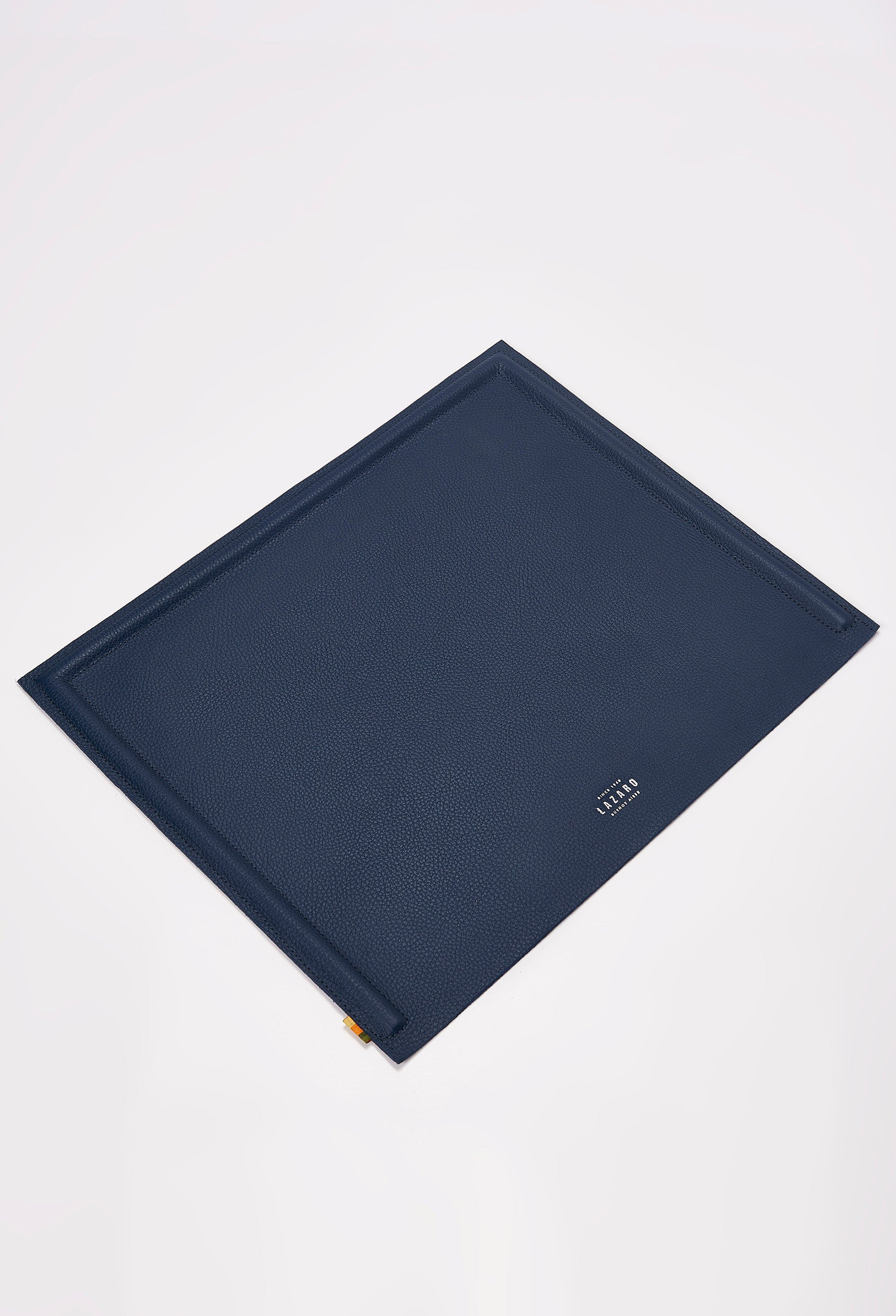 Front of a Blue Leather Minimalist Desk Mat with embossed Lazaro logo on it.