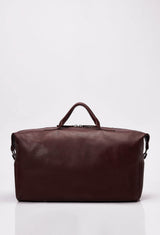 Front of a Coffee Leather Duffel Bag with Lazaro logo.