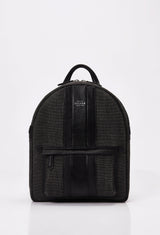 Front of a Lightweight Canvas Backpack made from distressed Panama canvas with Nappa leather trims in black. It has the Lazaro logo and a front zippered pocket.