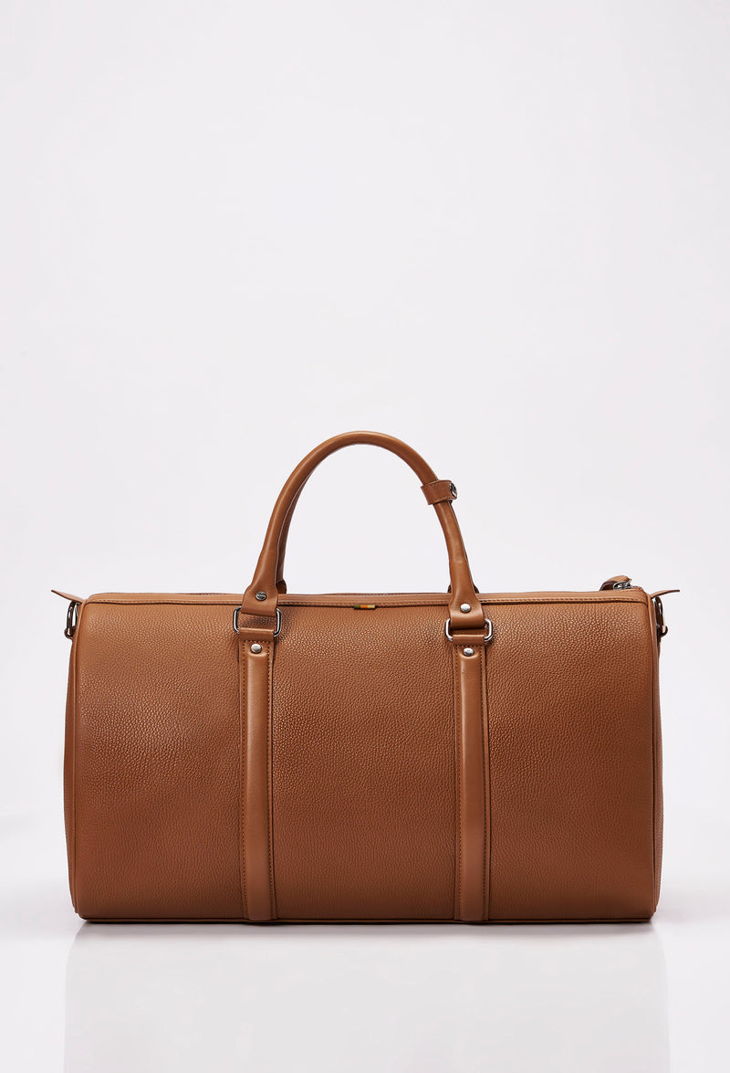 Rear of a Tan Leather Duffel Bag with leather handles.
