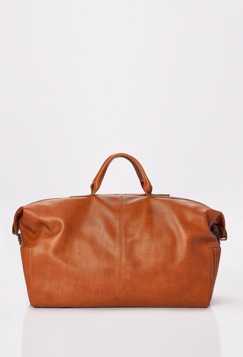 Rear of a Tan Leather Duffel Bag.